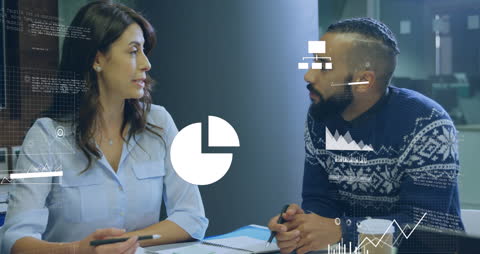 Business Professionals Analyzing Data Visualizations at Meeting