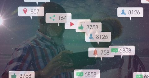 Mature Couple Relaxing at Beach with Digital Notifications Overlay