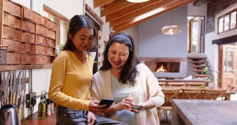 Mother and Daughter Bonding in Rustic Kitchen Setting