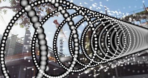 Dotted spiral overlay framing urban construction site with crane and geometric rings, bokeh
