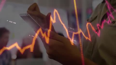 Business Professional Analyzing Financial Data on Smartphone in Office