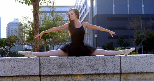Ballet Dancer Performing a Split in Urban Park - Download Free Stock Images Pikwizard.com