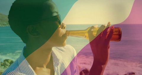 Outdoor Lifestyle Woman Enjoying Beverage by Seaside