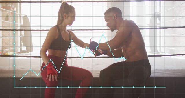 Fitness Trainer Adjusting Wrist Wraps of Female Boxer in Gym - Download Free Stock Images Pikwizard.com