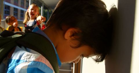Sad Schoolboy Being Bullied in School Corridor - Download Free Stock Images Pikwizard.com