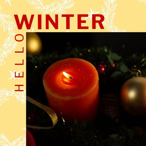 Warm candle and bauble centerpiece celebrating winter