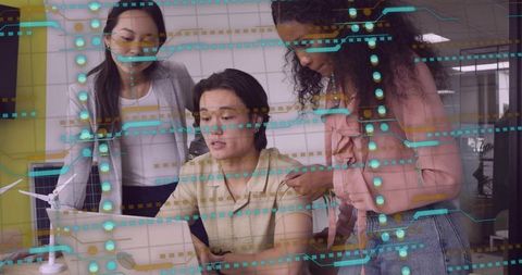 Creative Team Collaborating on Sustainable Technology Project