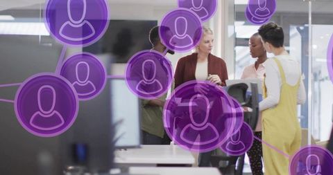 Diverse team collaborating in modern open-plan office with purple social network overlay