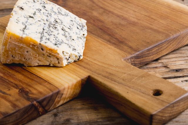 Close-Up of Blue Cheese on Wooden Serving Board - Download Free Stock Photos Pikwizard.com