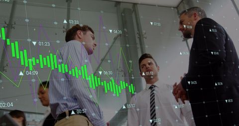 Business Professionals Analyzing Financial Data with Digital Interface Overlay