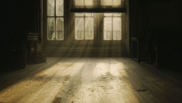 Sunlit Vintage Parlor with Weathered Wooden Floor and Multi-Pane Window