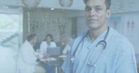 Confident Male Doctor in Modern Healthcare Setting with Team Collaboration