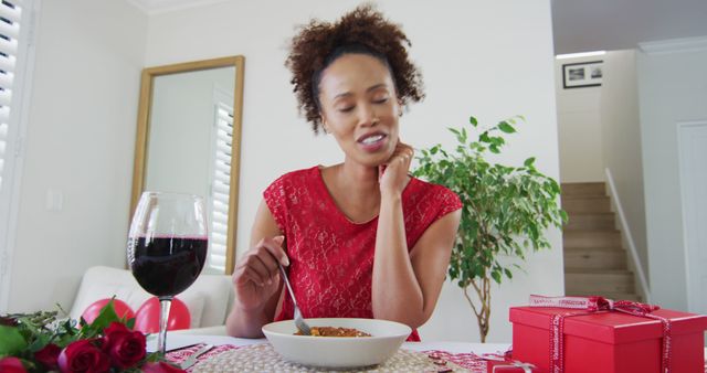 Biracial woman on a valentines date image call, drinking wine - Download Free Stock Photos Pikwizard.com
