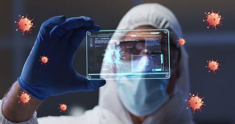 Scientist Analyzing Digital Display of Virus Cells with Protective Gear