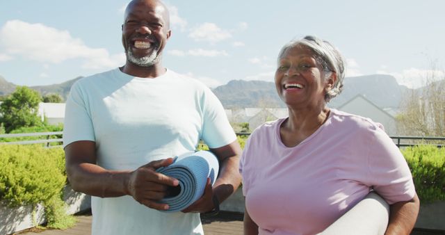 Image of happy senior american african couple exercising. Retirement lifestyle, spending time alone,active leisure time.