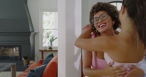 Joyful Friends Reuniting and Celebrating at Home