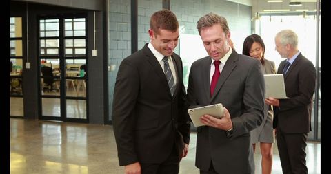 Professional Team Collaborating over Digital Technology - Download Free Stock Images Pikwizard.com