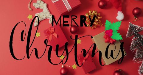 Festive merry christmas sign with red presents and decorations