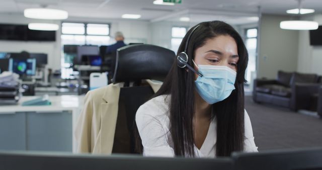 Customer Service Representative Wearing Face Mask in Office - Download Free Stock Images Pikwizard.com
