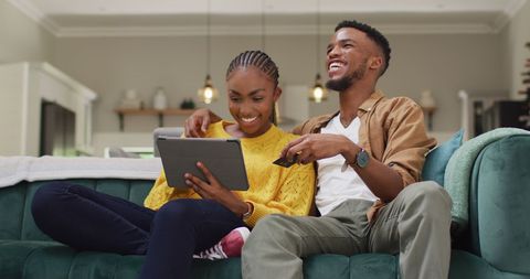 Happy Couple Online Shopping on Sofa at Home - Download Free Stock Images Pikwizard.com