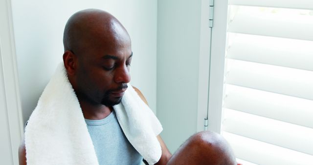 African American Man Relaxing After Workout at Home - Download Free Stock Images Pikwizard.com