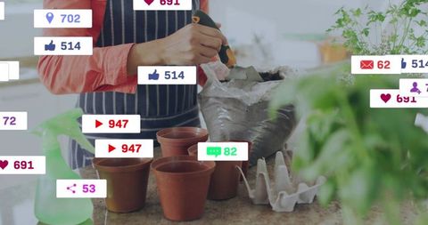 Urban gardener planting herbs in terracotta pots while social media icons floating