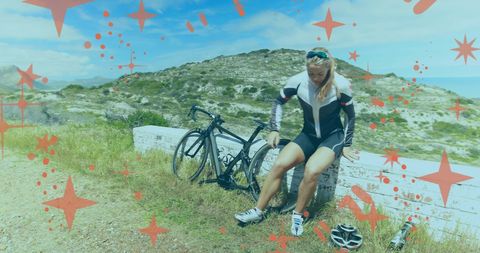 Cyclist Taking a Break in Scenic Outdoor Setting