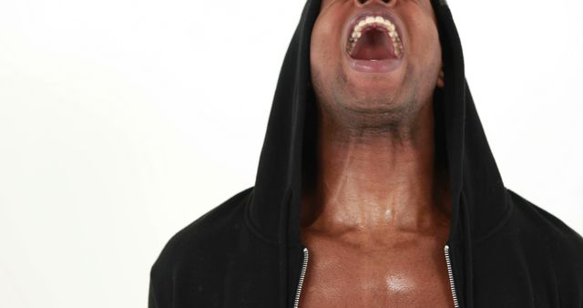 Muscular Man Yelling Wearing Black Hoodie - Download Free Stock Images Pikwizard.com
