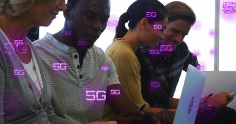 Diverse Team Collaborating with 5G Technology Concept