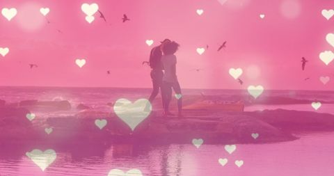 Romantic Biracial Couple at Beach with Heart Overlays