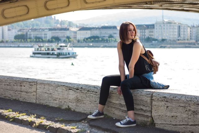 Woman in Black Tank Top and Black Leggings Sitting at Daytime - Download Free Stock Photos Pikwizard.com