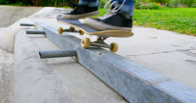 Skateboarder Grinding Rail at Outdoor Skatepark - Download Free Stock Images Pikwizard.com