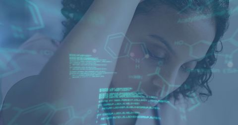 Tired female doctor analyzing medical data technology