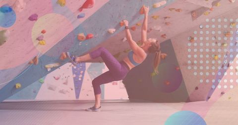 Fit Woman Bouldering at Vibrant Climbing Gym
