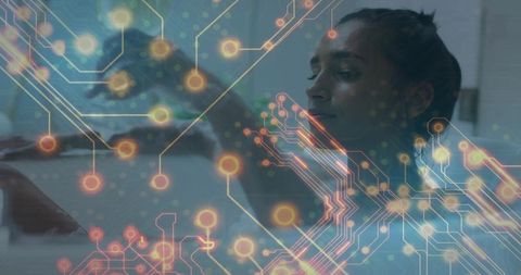 Woman interacting with digital circuit overlay representing ai, data flow and connectivity
