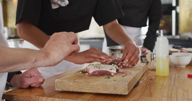 Chefs Preparing Meat with Seasoning on Wooden Board - Download Free Stock Images Pikwizard.com