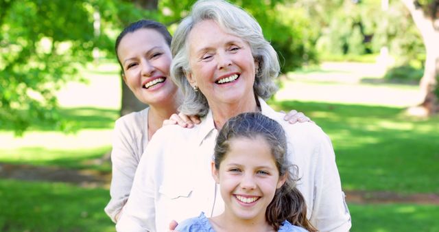 Happy Multigenerational Family Smiling Together Outdoors in Park - Download Free Stock Images Pikwizard.com