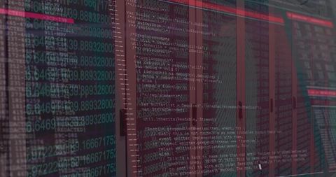 Glass-front server racks reflecting code overlay with red telemetry lights in data aisle