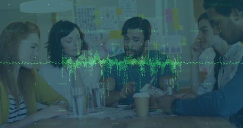 Business Professionals Discussing Finances with Digital Data Overlay