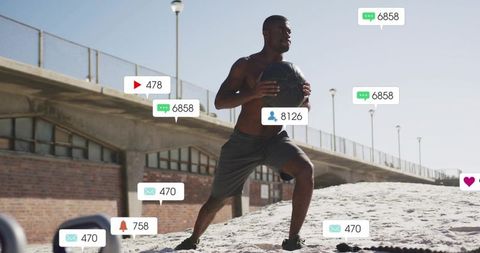 Silhouette of Athlete Exercising on Sunny Beach with Social Media Engagement
