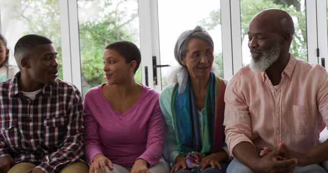 African American Family Smiling and Talking on Couch at Home - Download Free Stock Images Pikwizard.com