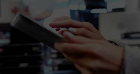 Employee Using Digital Tablet in Modern Workspace