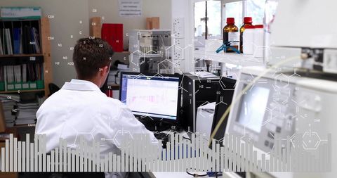 Scientist Analyzing Data in Modern Laboratory Environment - Download Free Stock Images Pikwizard.com
