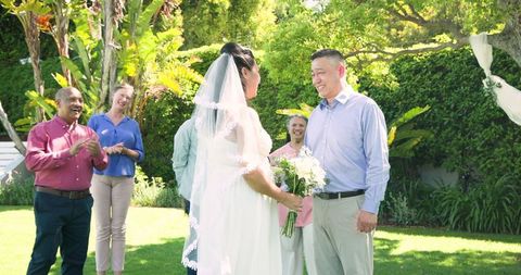 Senior Couple Tying Knot in Beautiful Garden Ceremony