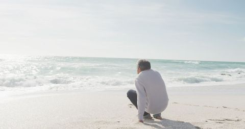 Senior Man Reflecting by Seaside at Sunset - Download Free Stock Images Pikwizard.com