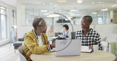 Innovative team discussing data in modern office