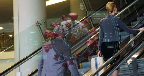 Business travelers using escalator with virus detection overlay at airport