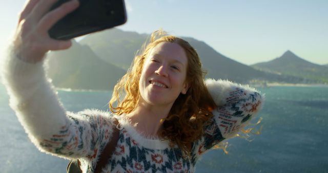 Happy Woman Taking Selfie Outdoors in Scenic Mountain Location - Download Free Stock Images Pikwizard.com