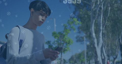 Young man engaged with technology in a connected world