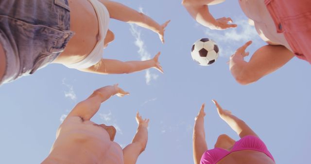Friends Tossing Soccer Ball Outdoors on Sunny Day - Download Free Stock Images Pikwizard.com